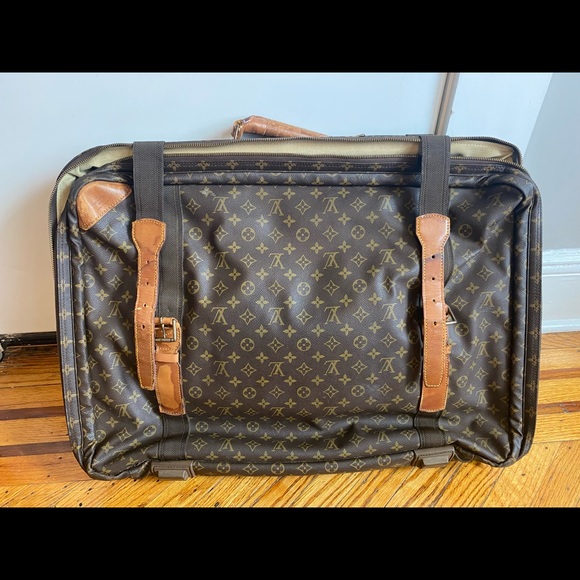 Louis Vuitton Other - Authentic Louis Vuitton setellite 65 travel HUGE!